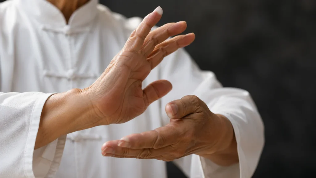 Tai Chi for seniors breathing motion with relaxed hands
